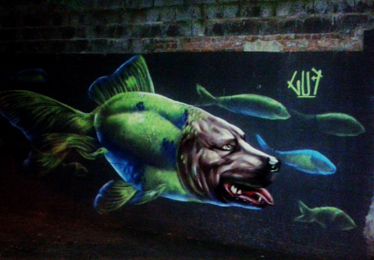 Grafite de Marcelo Gud, na rua Prof. Estêvão Pinto, Serra.